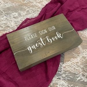 Wooden “Sign our guestbook” wedding decor